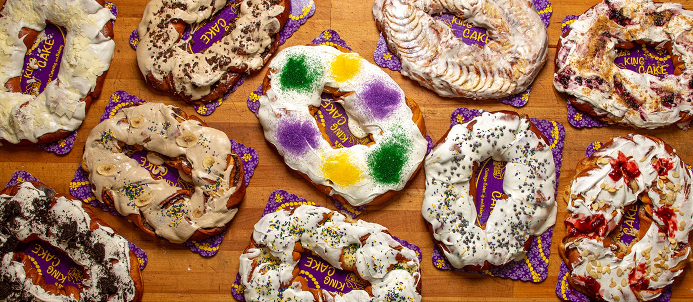 Caluda's king cakes on a wooden table